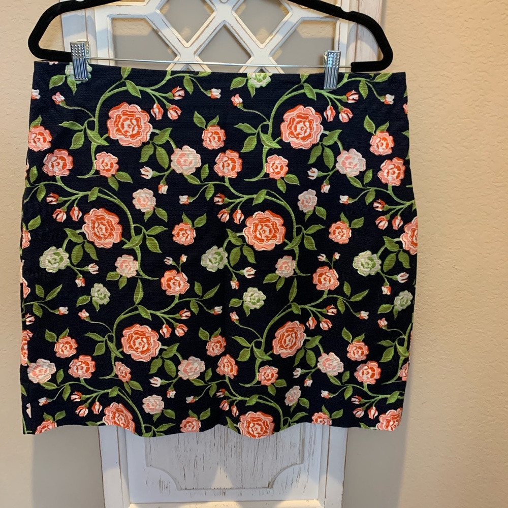 Floral lined navy skirt. New with tags.